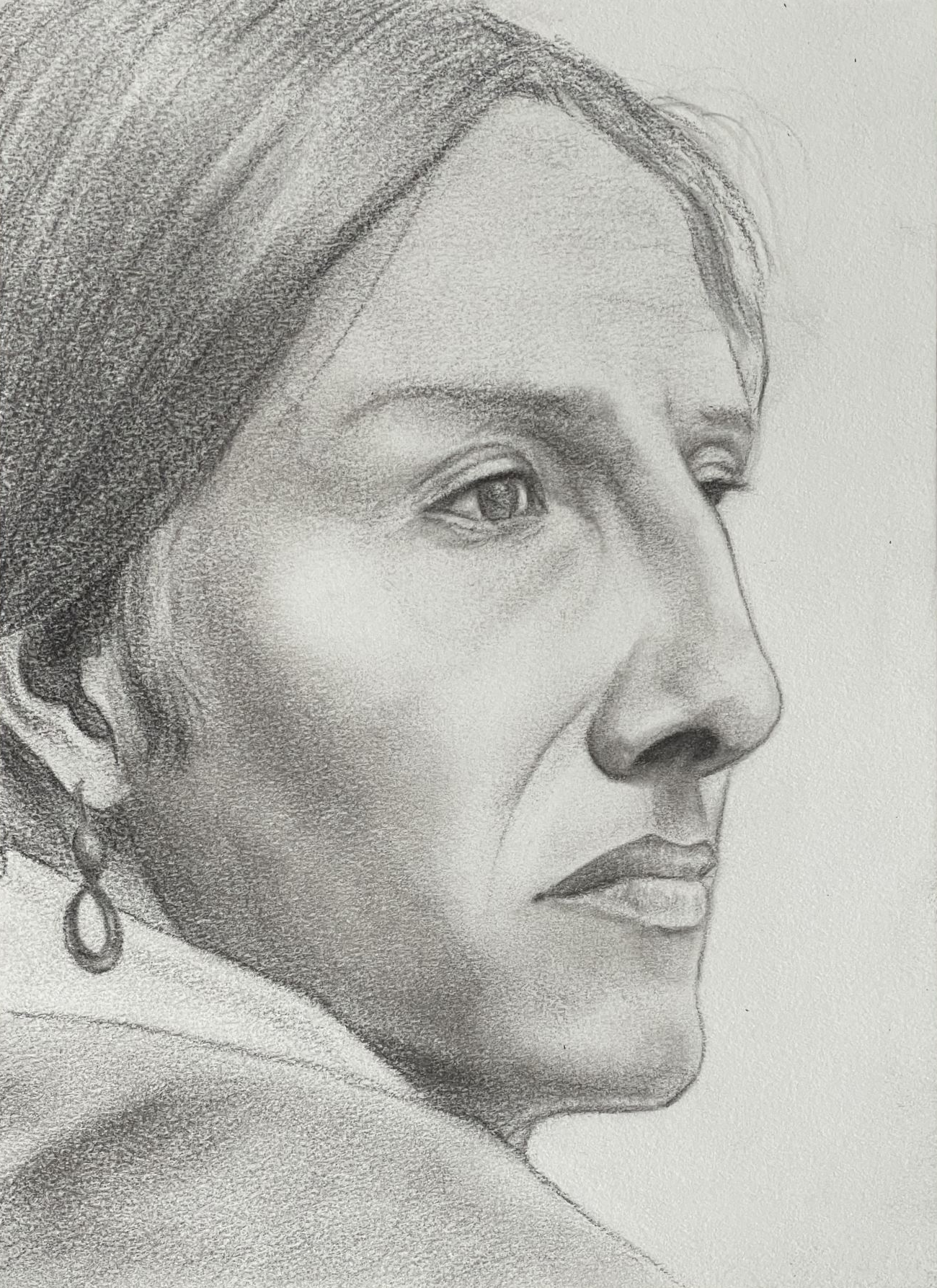 Smooth-skinned Native American man with a pensive look.